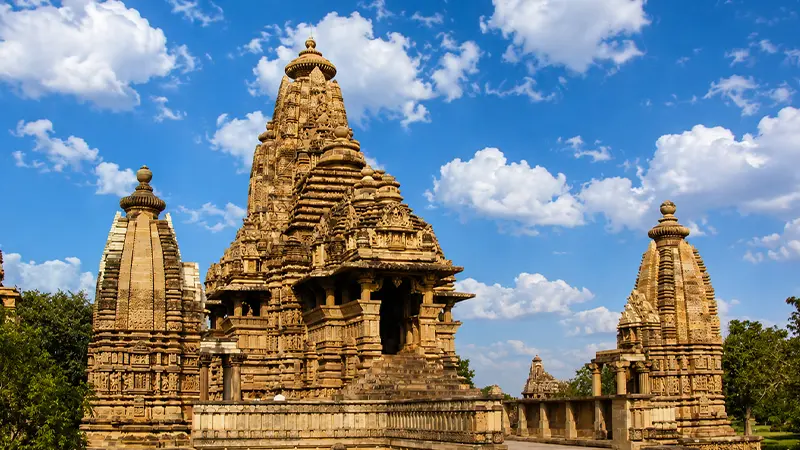 Ancient Nagara style temple complex featuring detailed stone craftsmanship