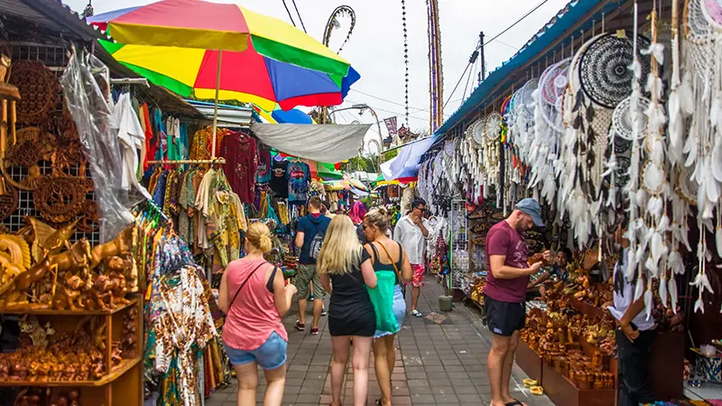 Colorful handicraft shopping street in a Bali local market