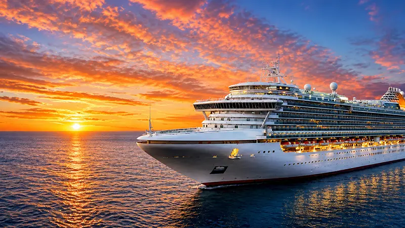 Cordelia Cruise sailing across the Bay of Bengal during a colorful sunset from Chennai