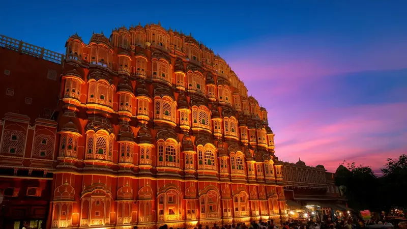 Illuminated Hawa Mahal Palace at sunset in Jaipur