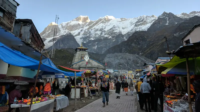 Pilgrims walking through Kedarnath market towards Kedarnath Temple