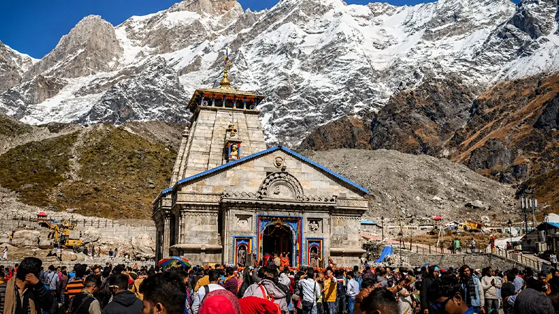 Front view of Kedarnath Temple with snow-clad peaks