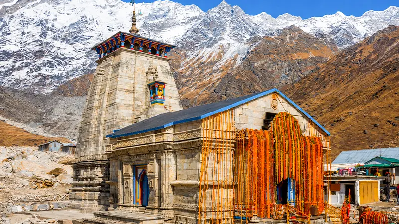 Side view of Kedarnath Temple in the Himalayan valley