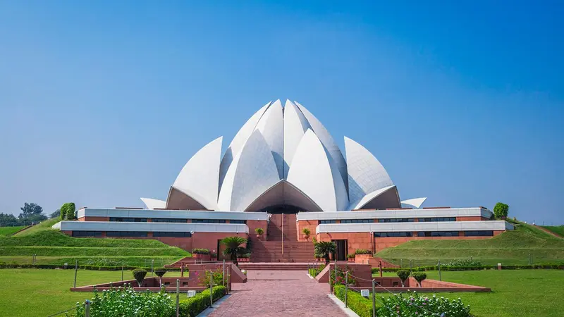 Iconic Lotus Temple surrounded by landscaped gardens in New Delhi