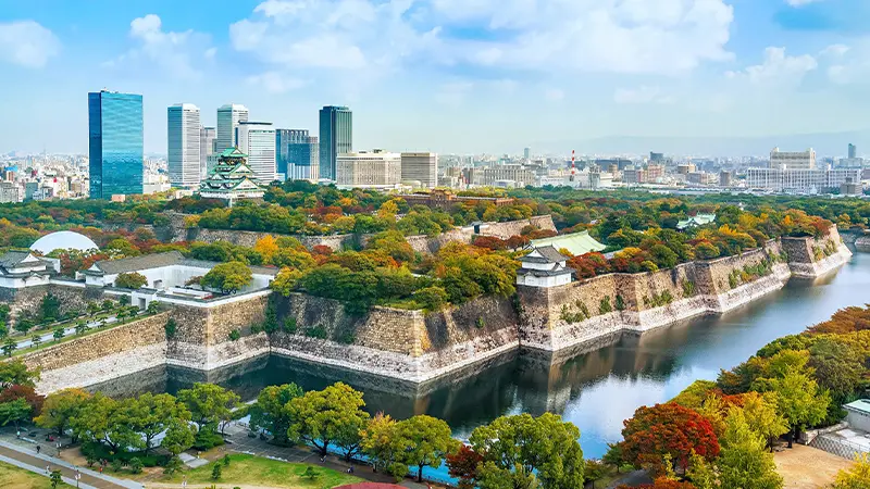 Osaka Castle surrounded by modern city skyline