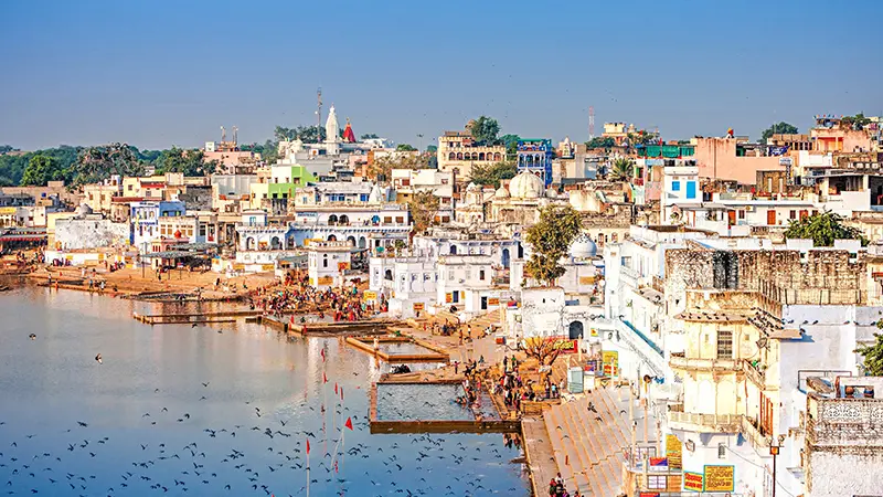 Scenic view of Pushkar Lake ghats and temples in Rajasthan