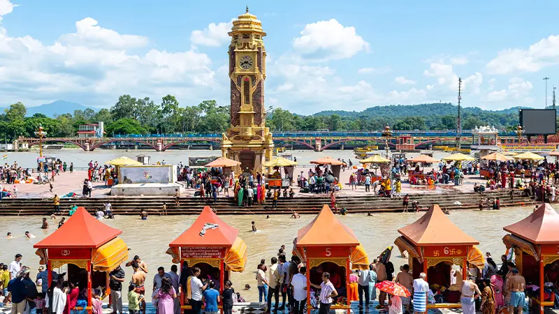 Pilgrims gathering at a major riverfront pilgrimage and bathing site