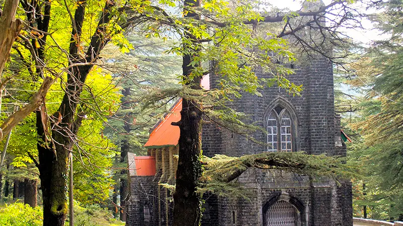 Historic St. John in the Wilderness Church surrounded by deodar forest near Dharamshala