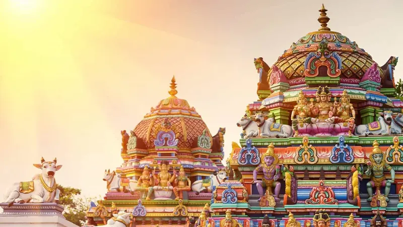 Colorful Dravidian temple domes showcasing intricate South Indian craftsmanship