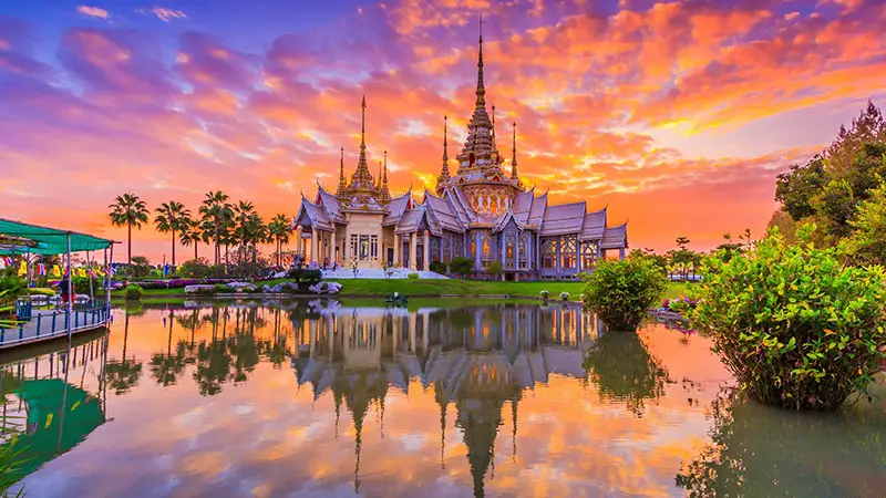 White Temple in Chiang Rai glowing at sunset