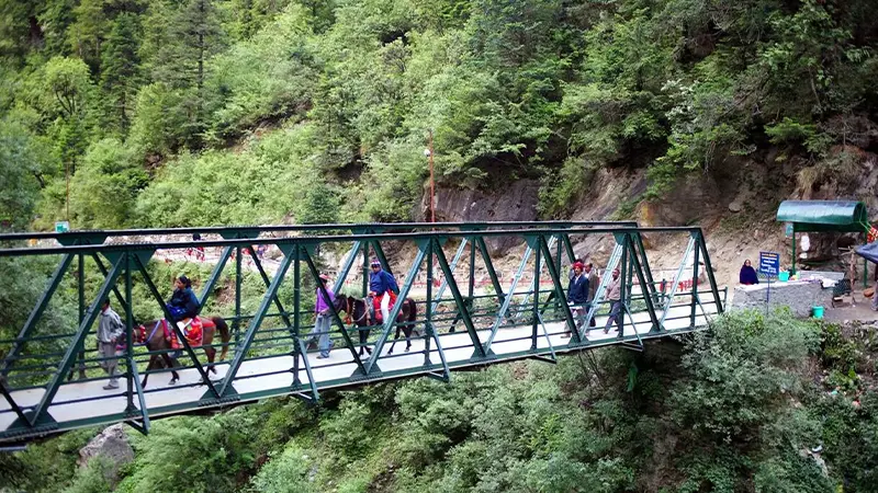 Pilgrims crossing bridge on the Yamunotri trekking route
