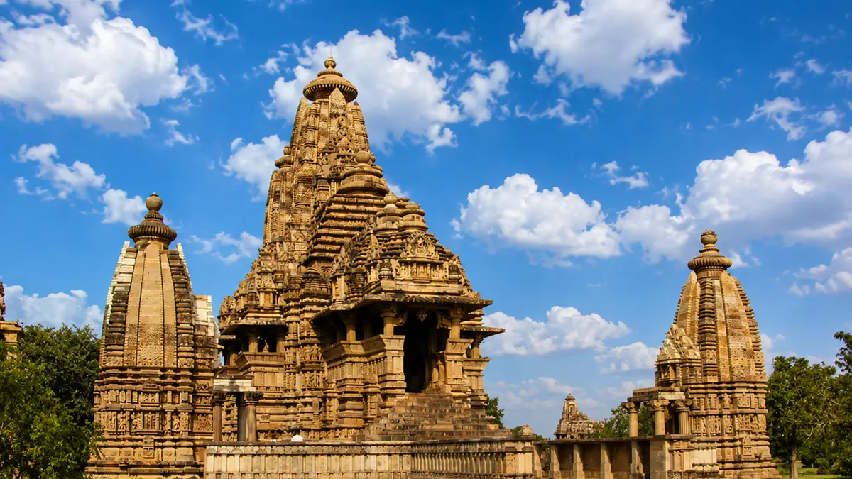 Ancient Nagara style temple complex featuring detailed stone craftsmanship