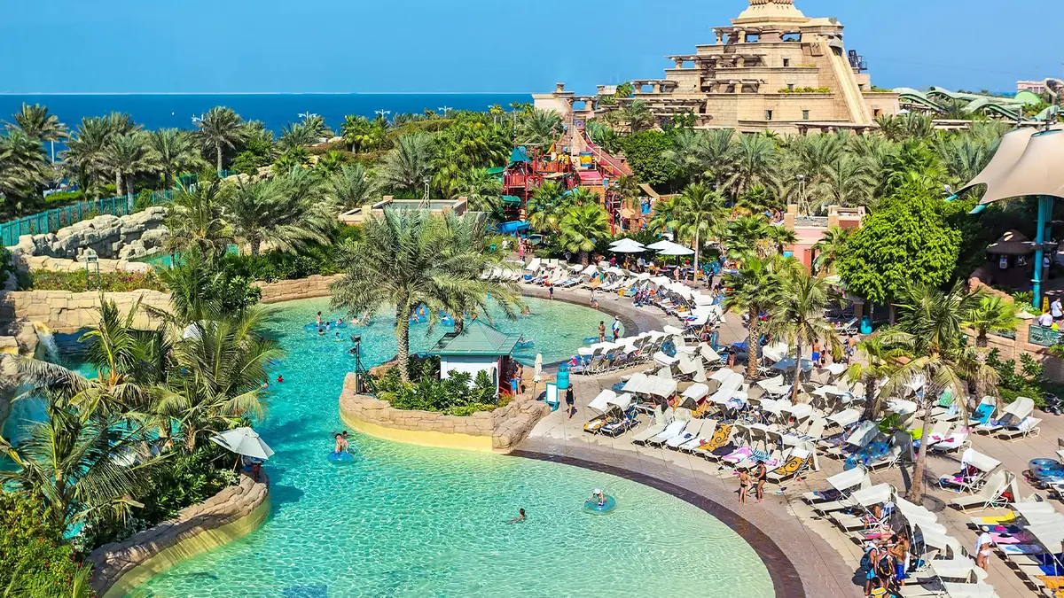 Visitors enjoying attractions at Atlantis Aquaventure Waterpark in Dubai