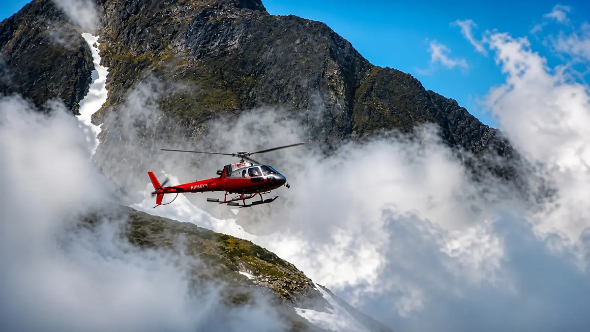 Helicopter flying towards Badrinath in the Himalayas