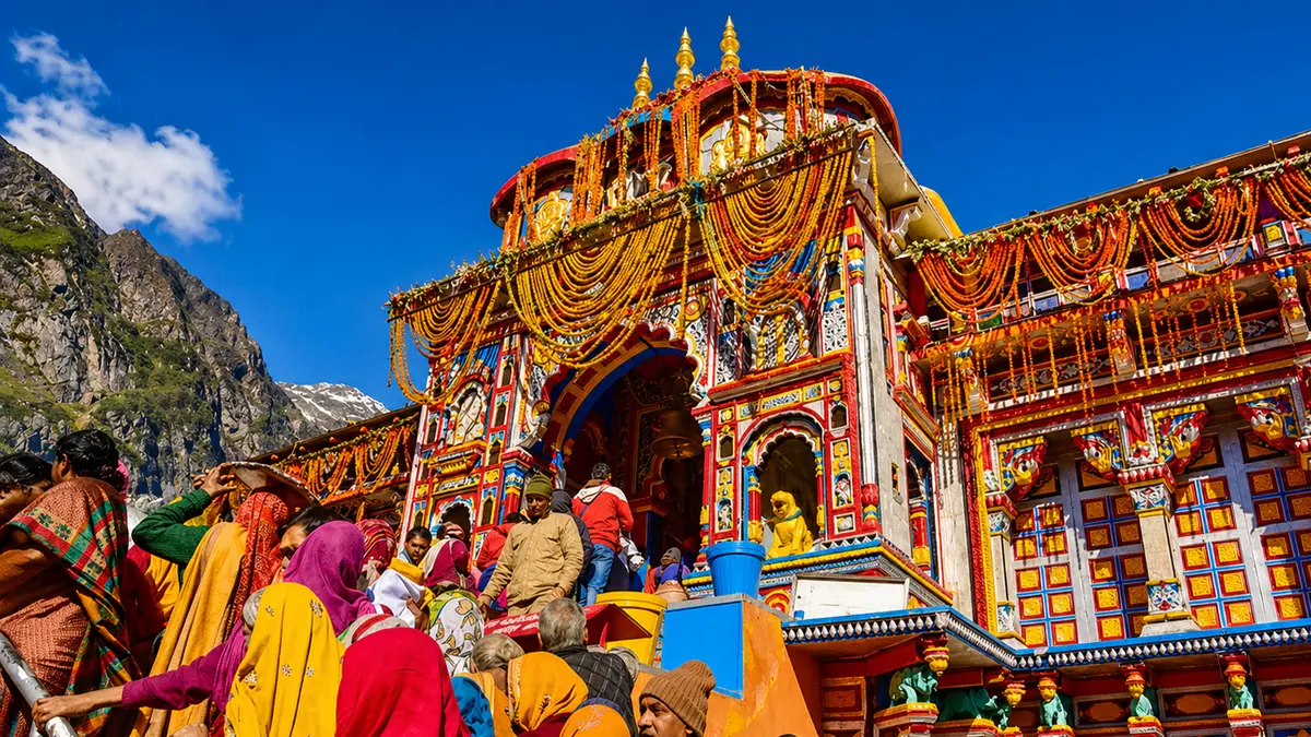 Pilgrims entering the decorated Badrinath Temple