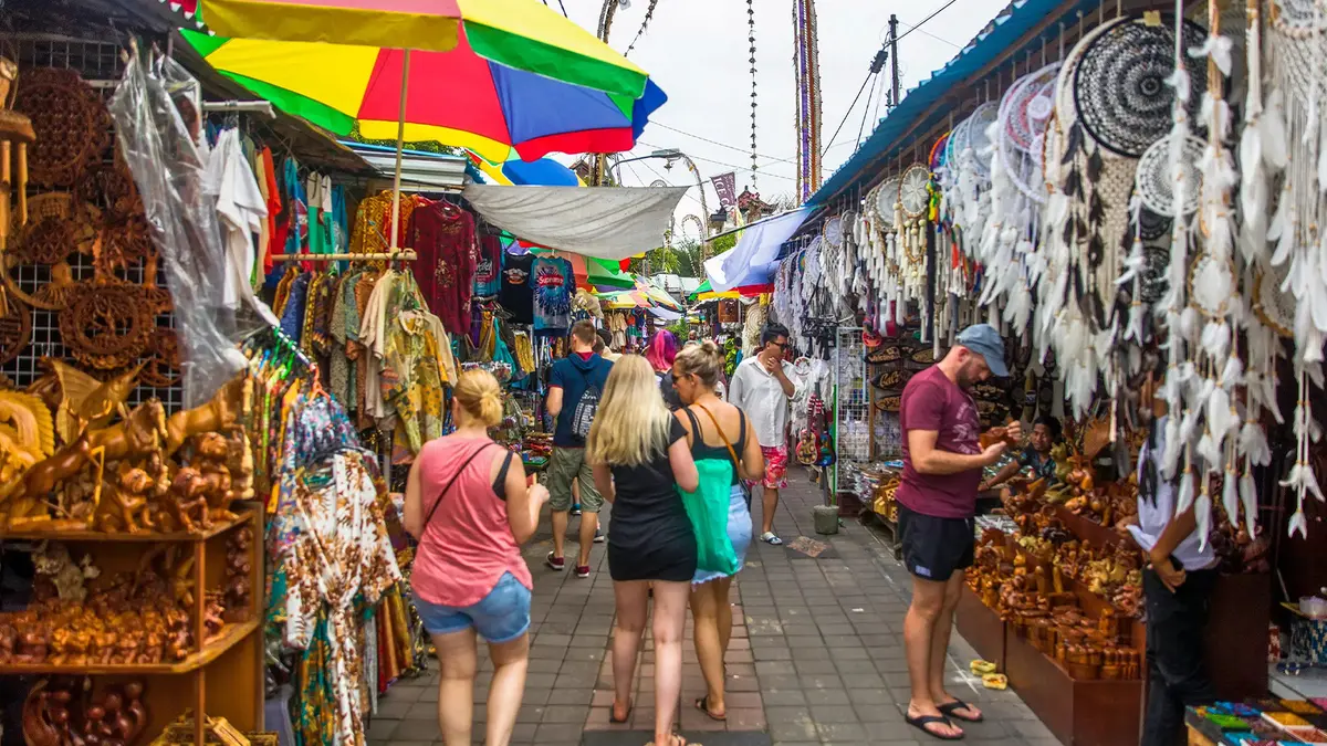Colorful handicraft shopping street in a Bali local market