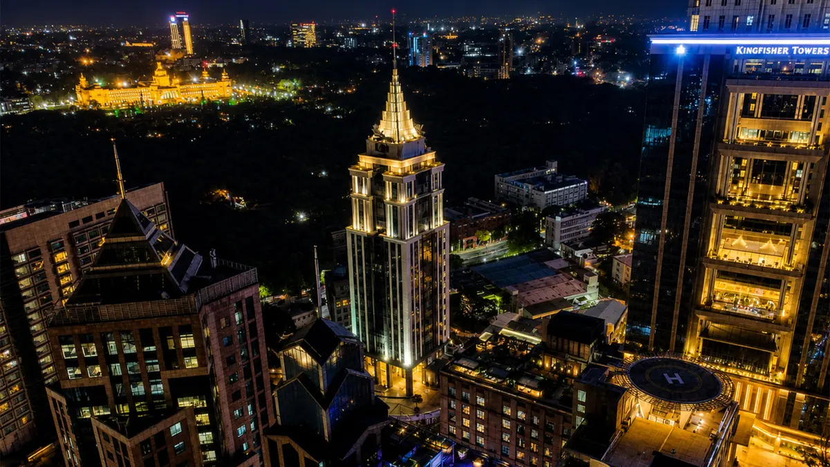 Illuminated Bangalore city skyline with modern skyscrapers