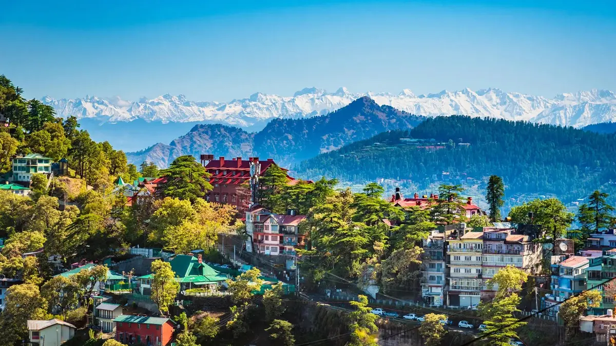 Panoramic view of Dalhousie hill town with the snow-covered Dhauladhar Range in Himachal Pradesh