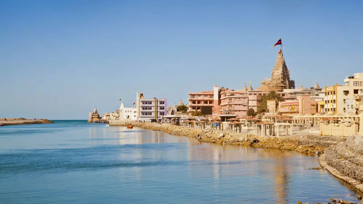 Dwarkadhish Temple overlooking Gomti Ghat and the Arabian Sea in Dwarka Gujarat