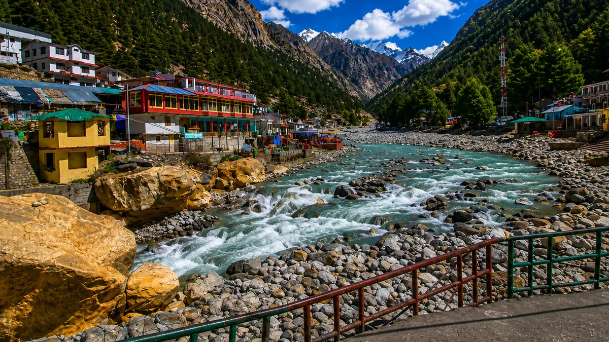 Riverside view of Gangotri town with the Bhagirathi River flowing through the Himalayas
