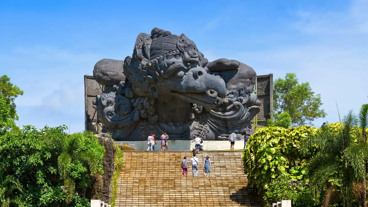 Visitors exploring the iconic Garuda Wisnu monument at GWK Cultural Park in Bali