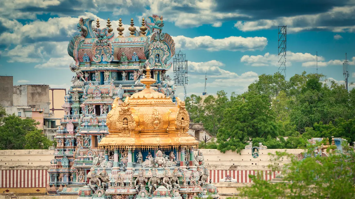 Golden vimana landmark rising above an ancient South Indian temple complex