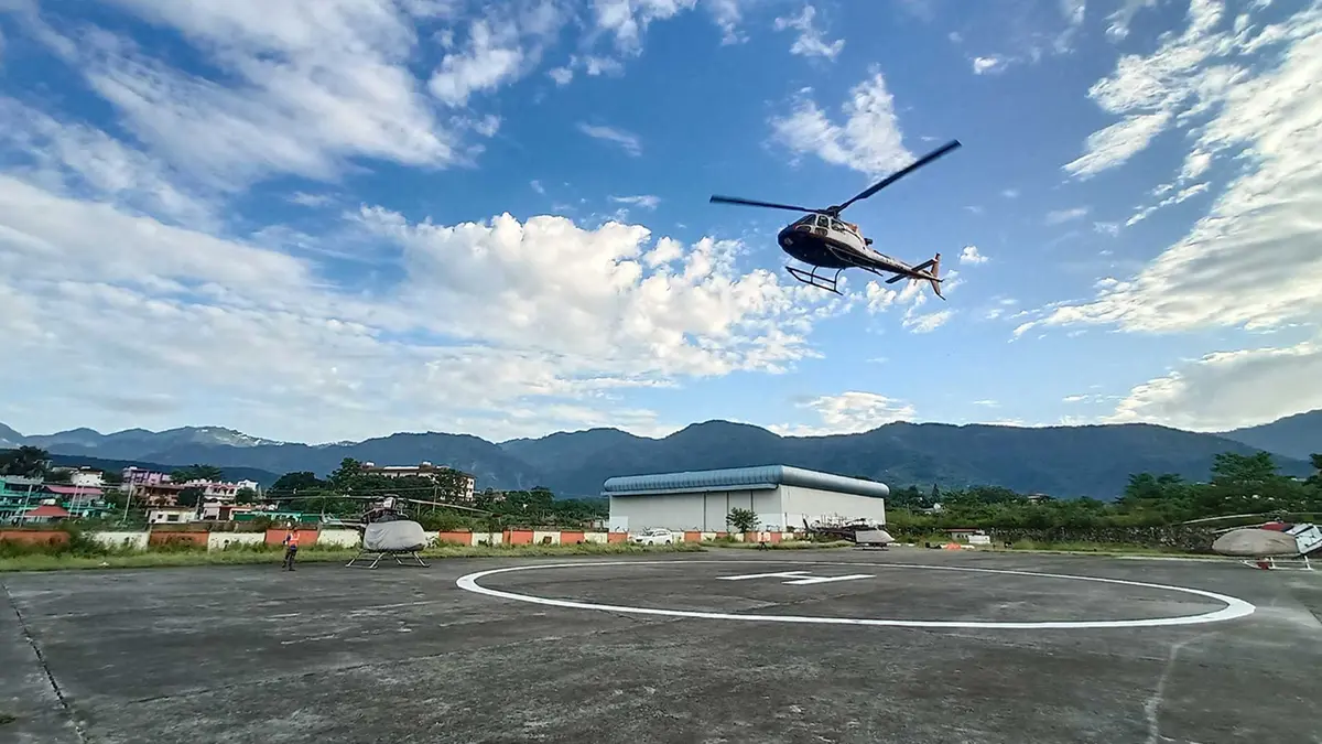 Helicopter taking off from helipad for Char Dham Yatra