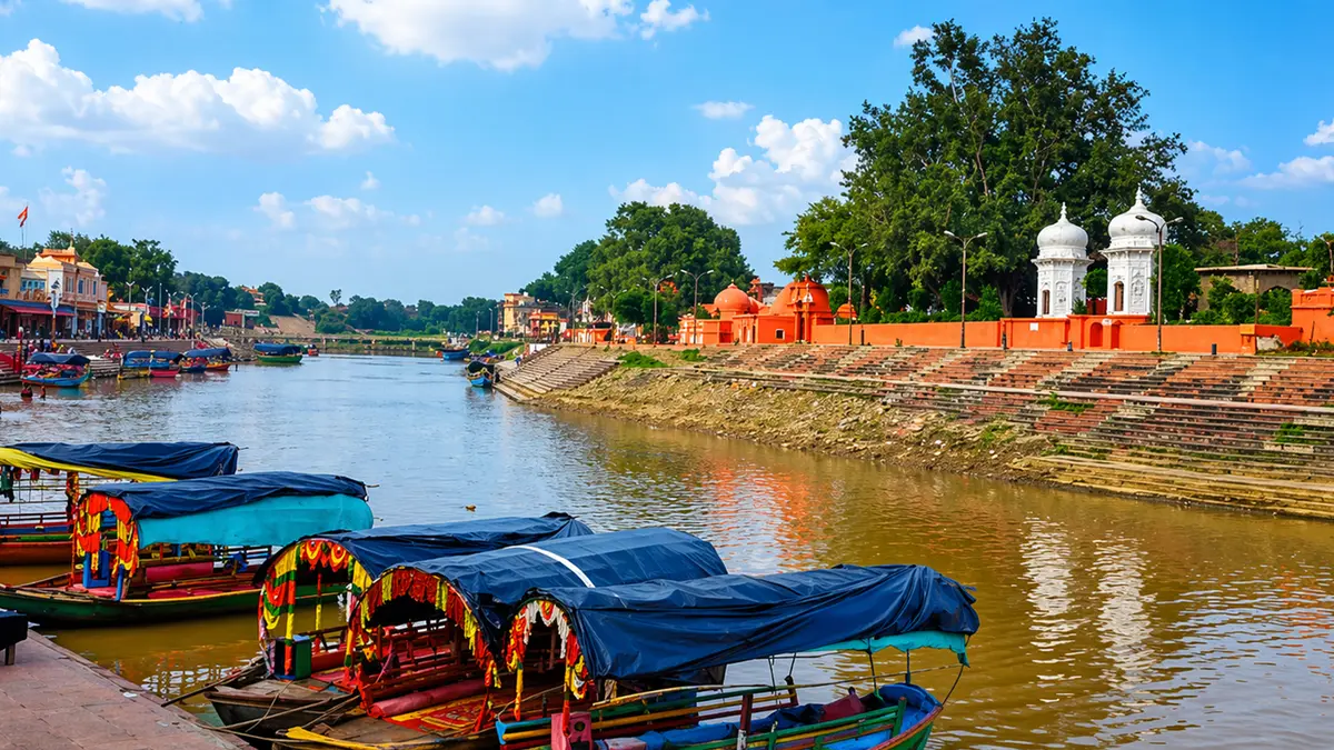 Traditional boats anchored along a historic waterway frequented by pilgrims