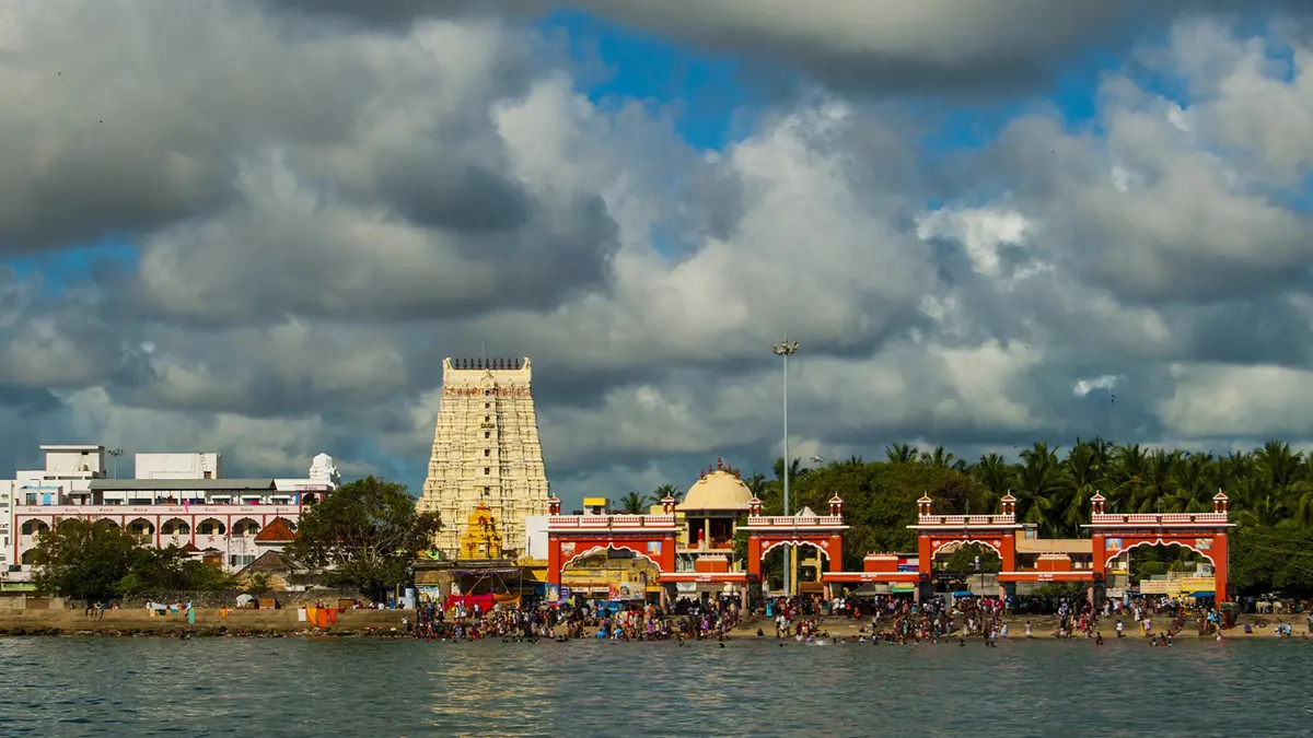 Holy seashore ritual ghat where pilgrims gather for sacred ceremonies