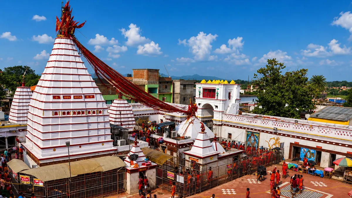 Kamakhya temple complex with white domes and red ceremonial cloth in Guwahati