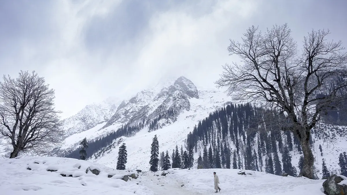 Snow-covered mountain valley in Kashmir during winter