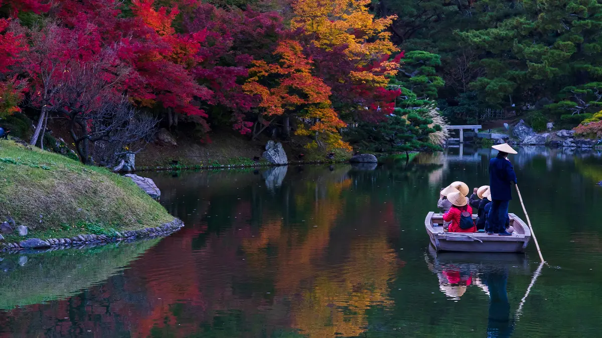 Kyoto garden boat in autumn season