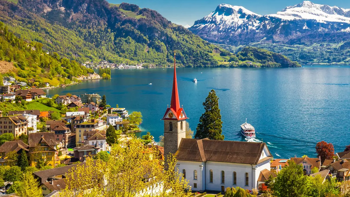Lakeside church overlooking Lake Thun in Switzerland