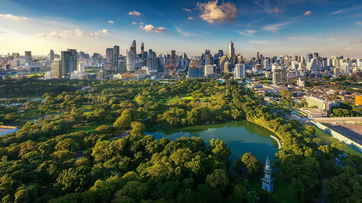 Lumphini Park with Bangkok city skyline