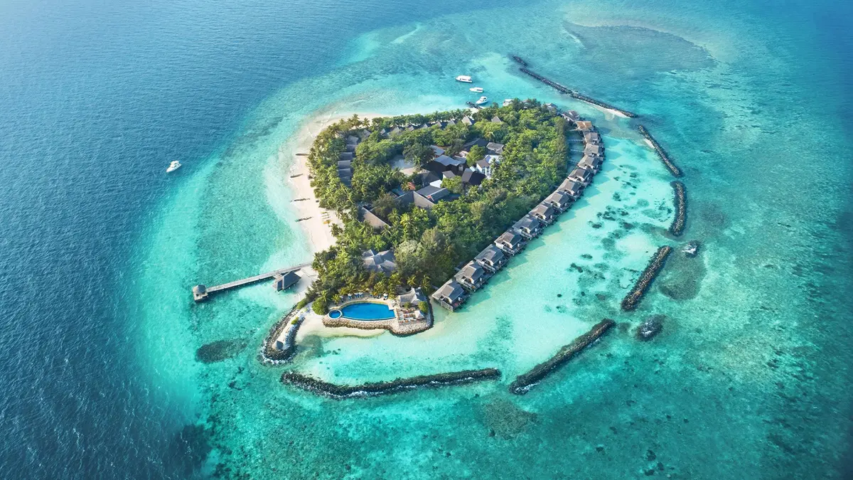 Aerial view of a luxury private island resort in the Maldives