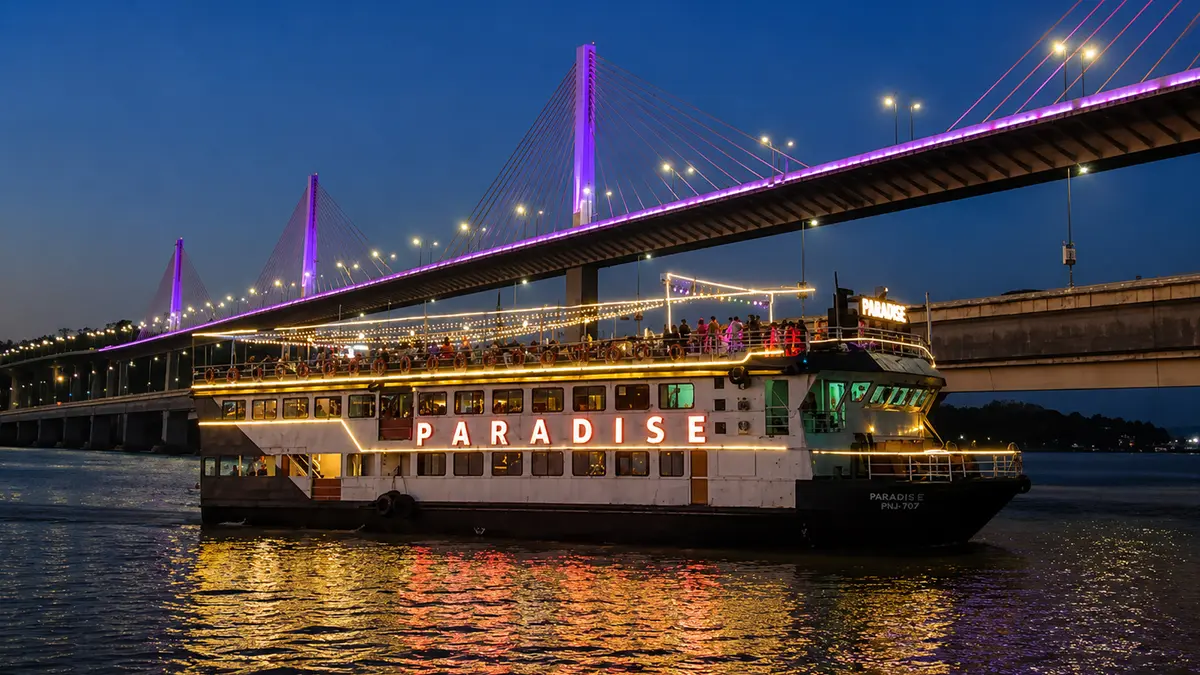 Evening cruise on the Mandovi River with Atal Setu illuminated in Panaji Goa
