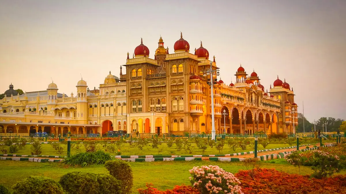 Mysore Palace illuminated at sunset