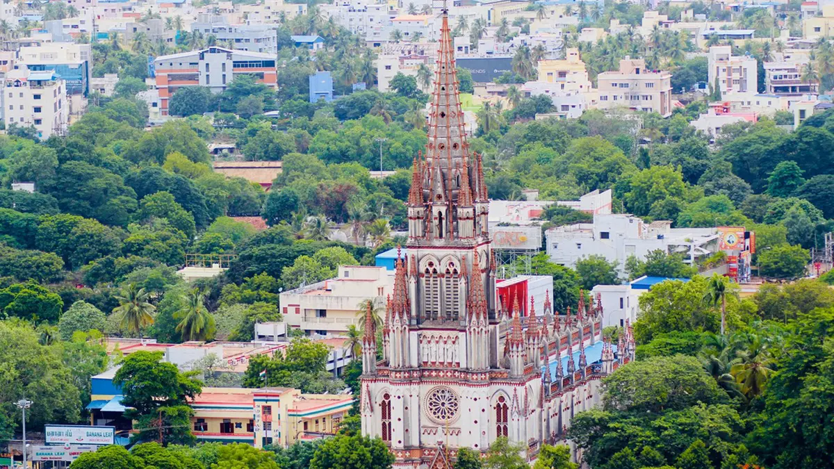 Neo-Gothic spiritual landmark rising above the green cityscape