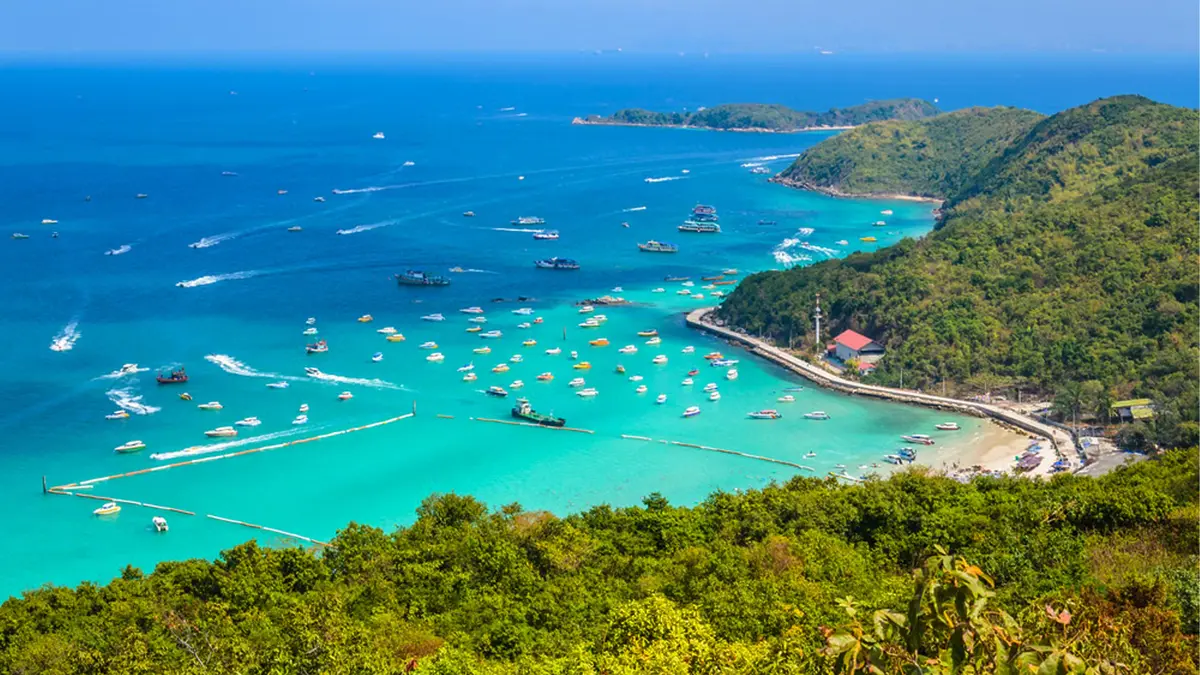 Panoramic view of Coral Island near Pattaya with turquoise waters and anchored boats