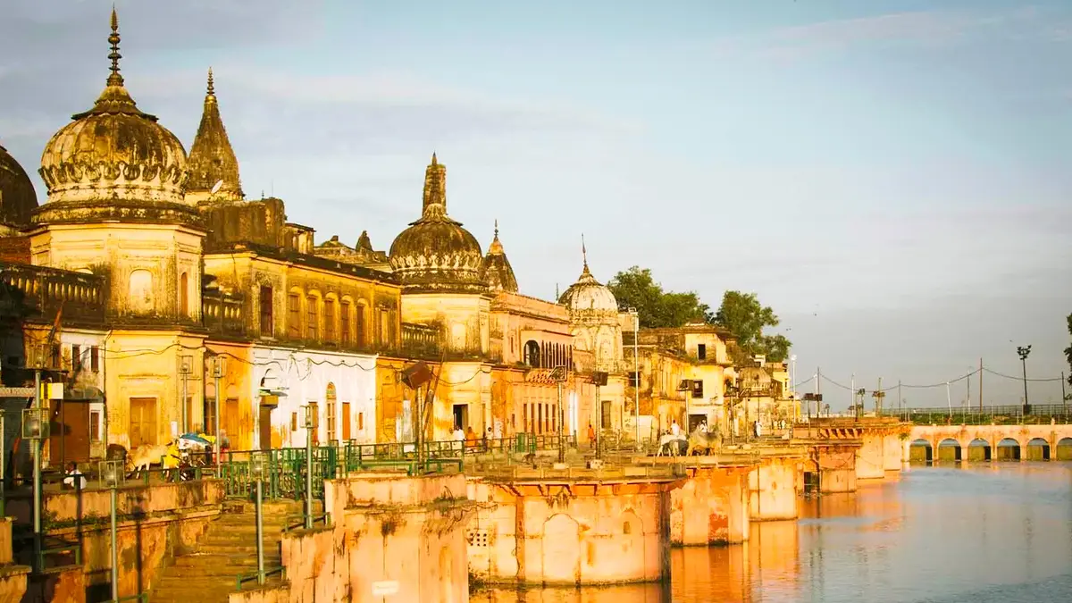 Historic royal ghats lining a sacred waterfront with classical architecture