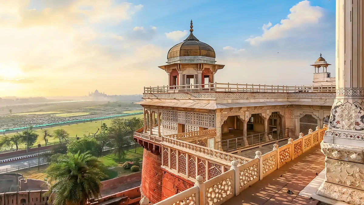 Historic palace balcony overlooking gardens and riverside landscapes