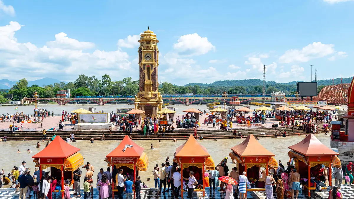 Pilgrims gathering at a major riverfront pilgrimage and bathing site