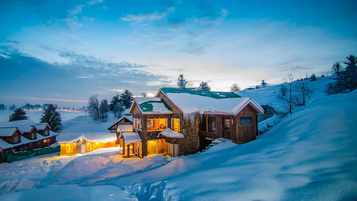 Snow-covered honeymoon cottage in Kashmir