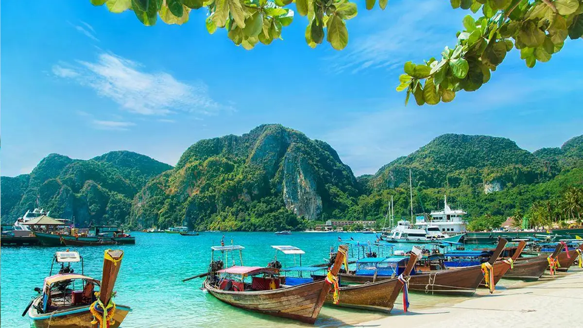 Traditional boats anchored in a tropical bay of Andaman