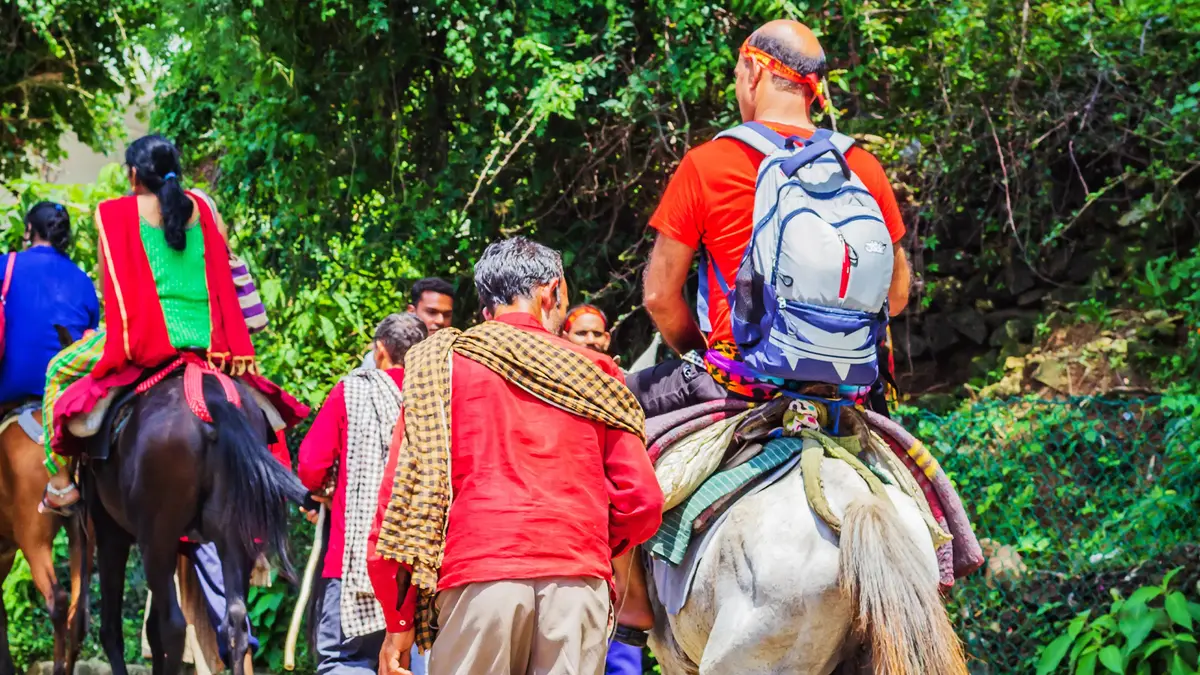 Pilgrims riding ponies on Vaishno Devi route