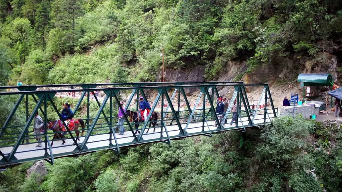 Pilgrims crossing bridge on the Yamunotri trekking route
