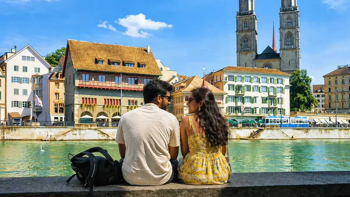 Couple enjoying the riverside view in Zurich Old Town Switzerland