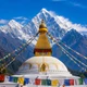 Nepal Buddhist stupa with Himalayan mountain backdrop