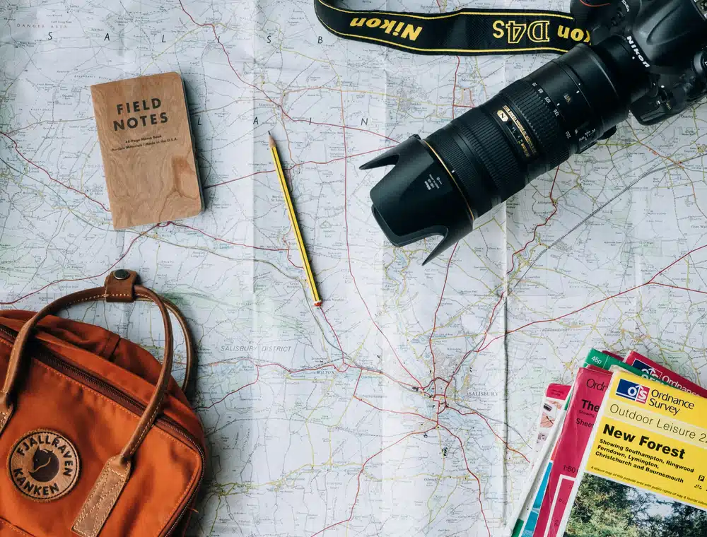 Traveller preparing confirmed tour documents and booking information