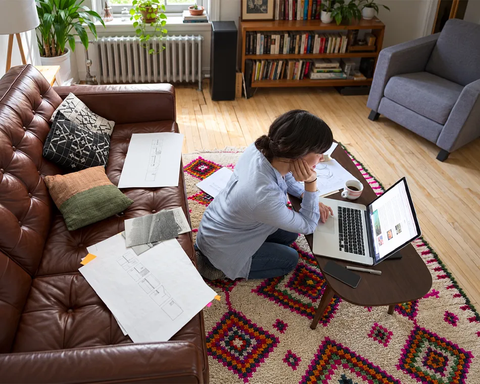 Woman working professionally from a home office as a travel advisor